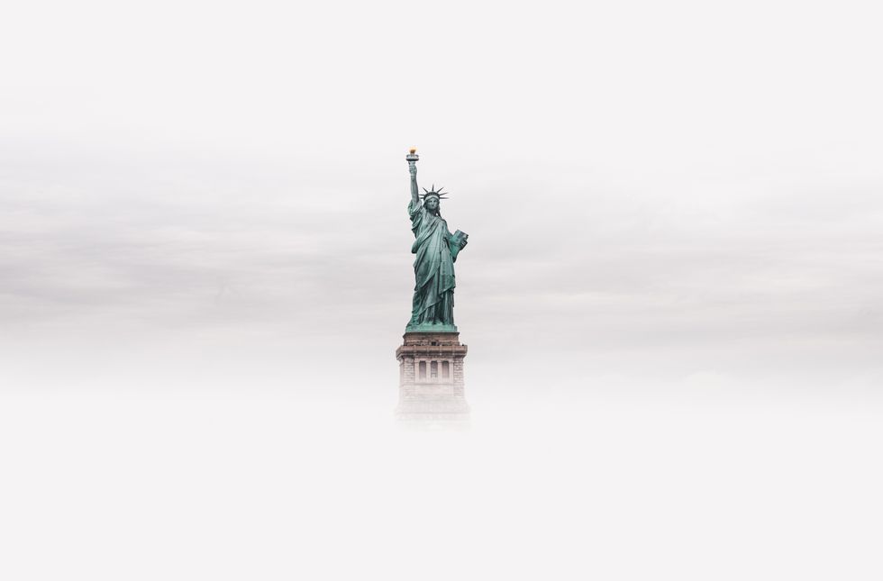 statue of liberty in fog