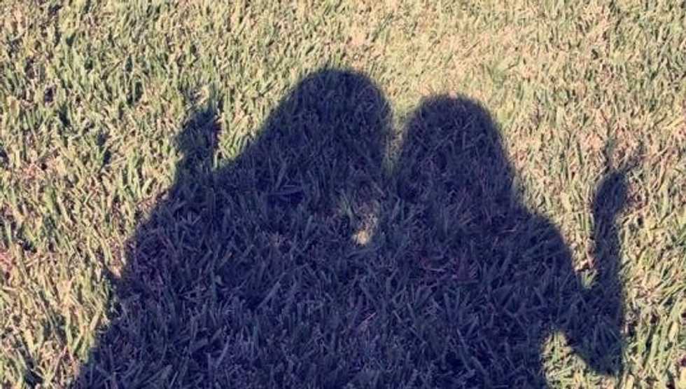 The shadow of two friends.