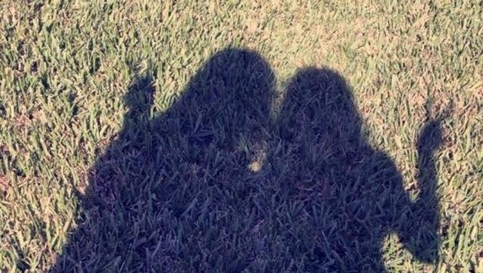 The shadow of two friends.
