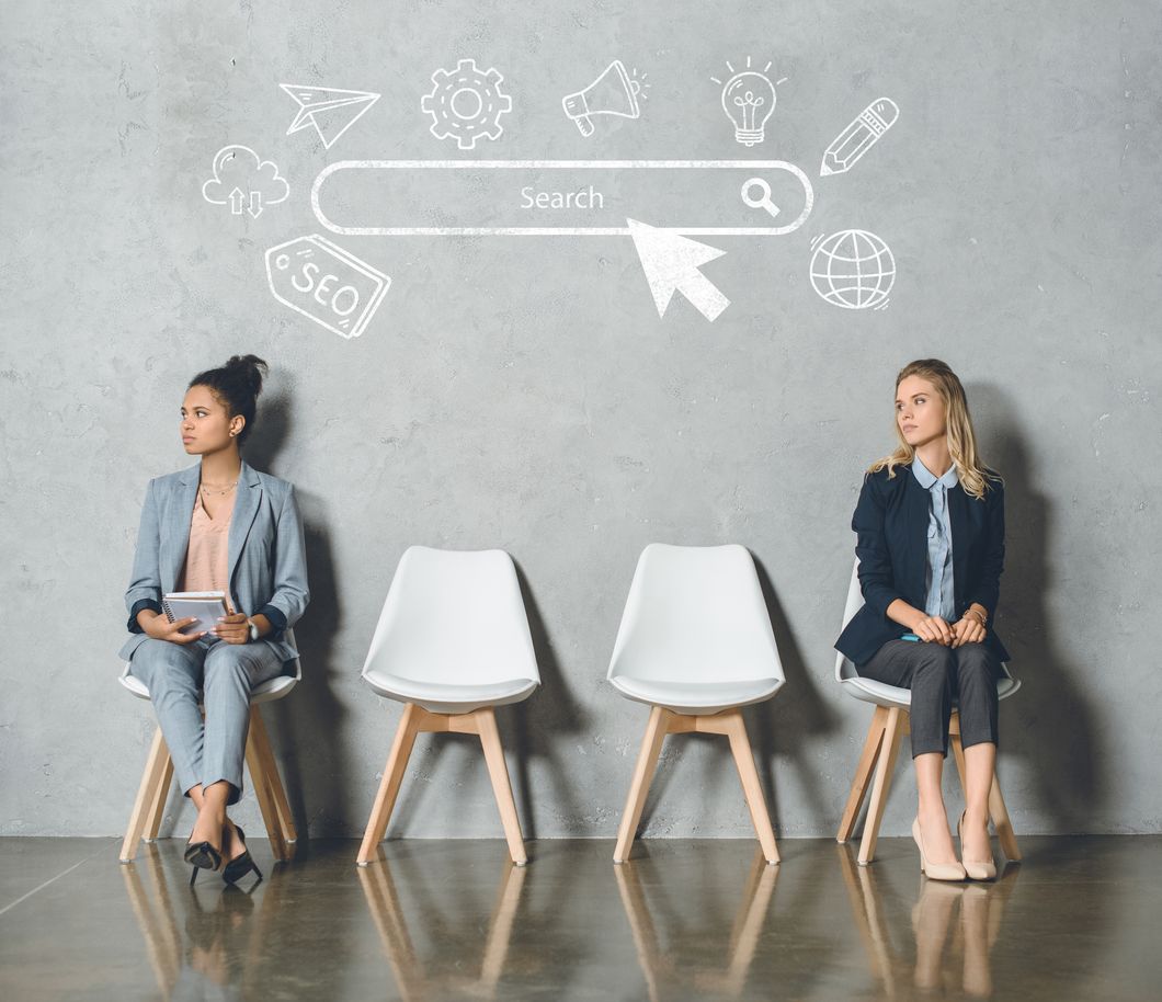 Two candidates waiting for a job interview