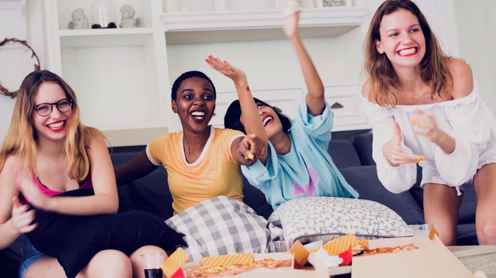 Two friends sitting on a couch