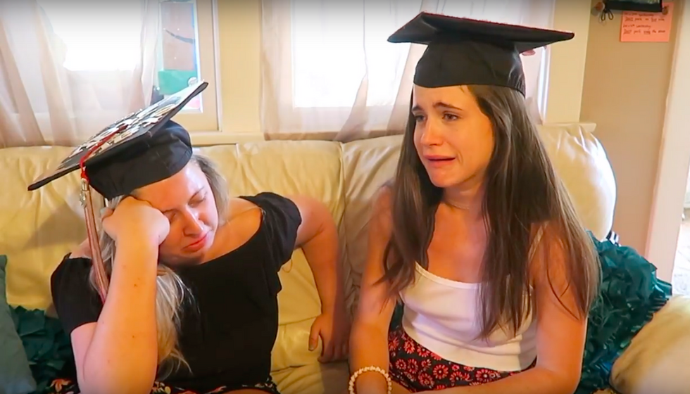 two girls in graduation caps