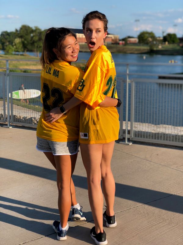 two girls in jerseys