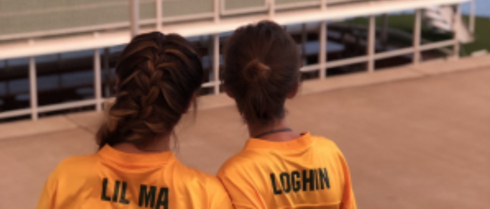 two girls in yellow jerseys