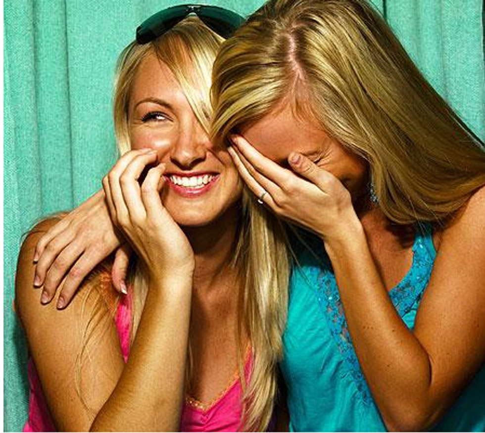 Two girls laughing