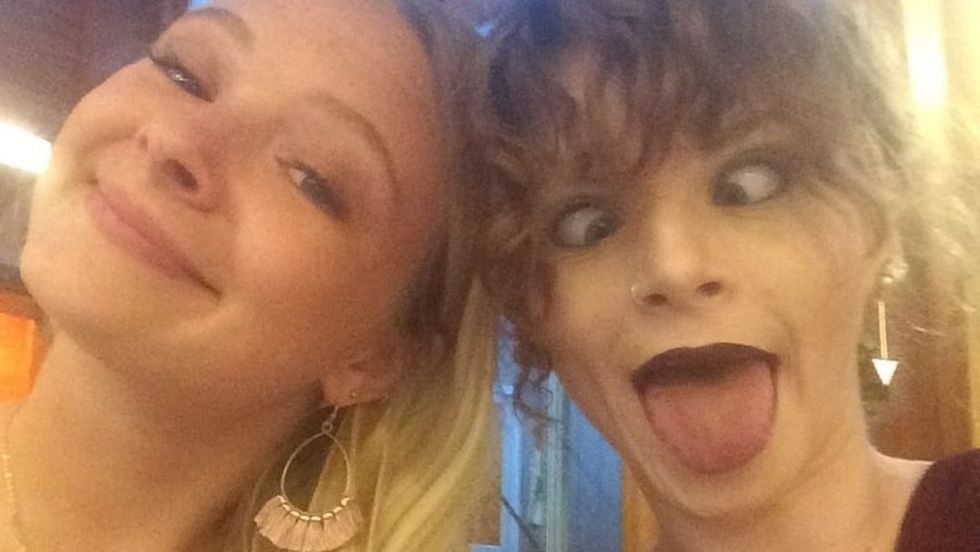 Two girls making faces