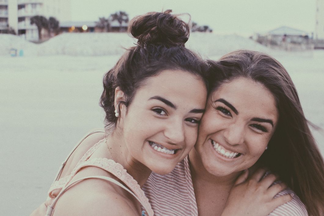 two smiling young women