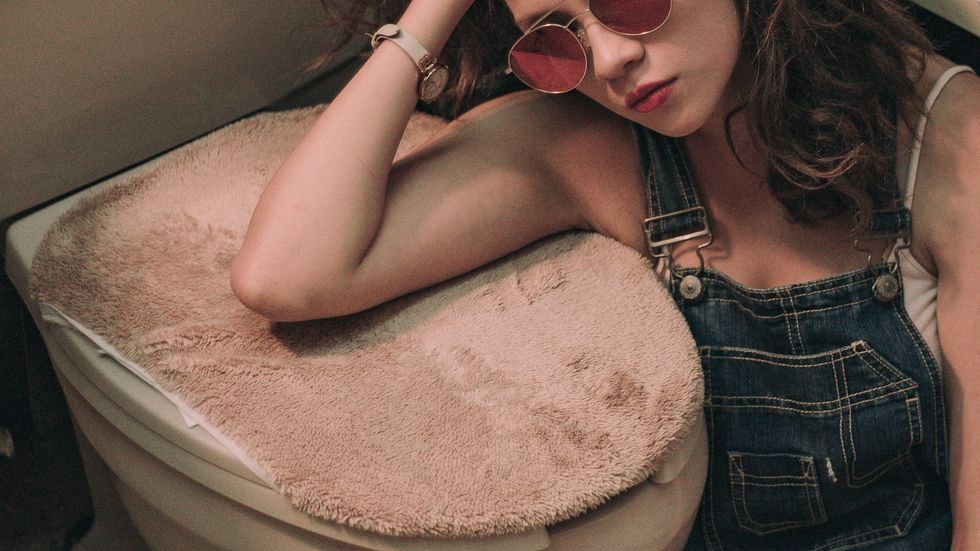 View of the inside of a bathroom stall