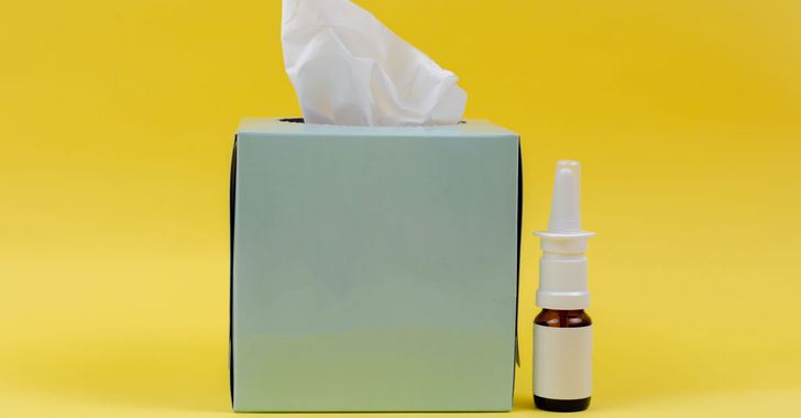white and brown bottle beside white tissue box