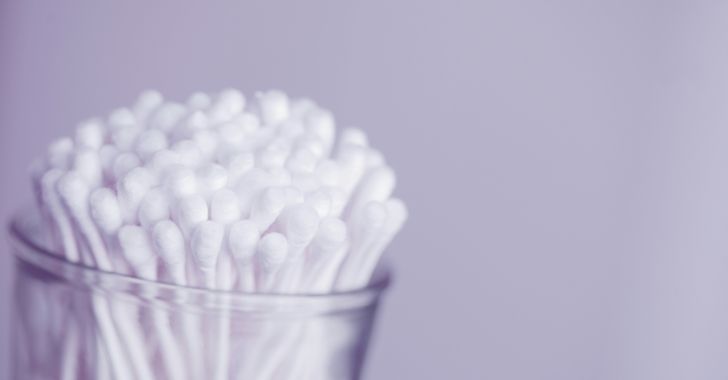 white cotton buds in container