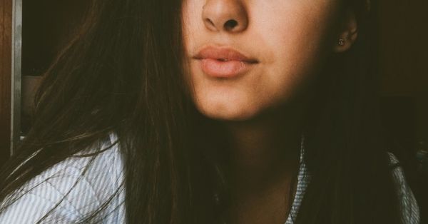 woman blowing a kiss