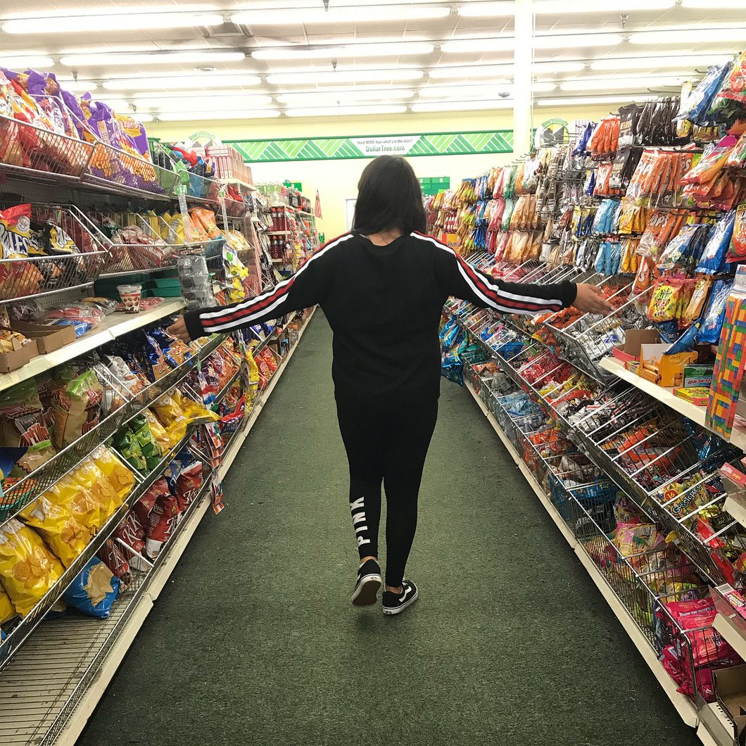 Woman buying candy at the store
