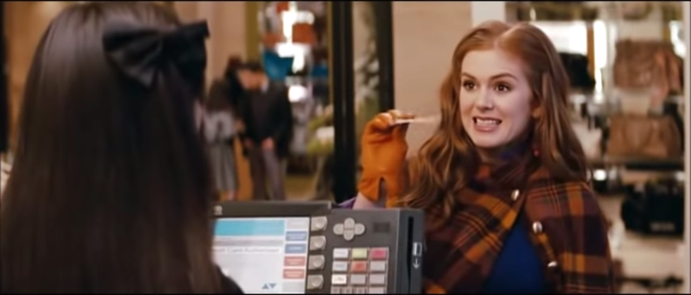 woman holding shopping bags