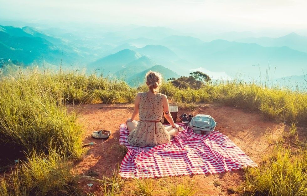 woman looking at mountains