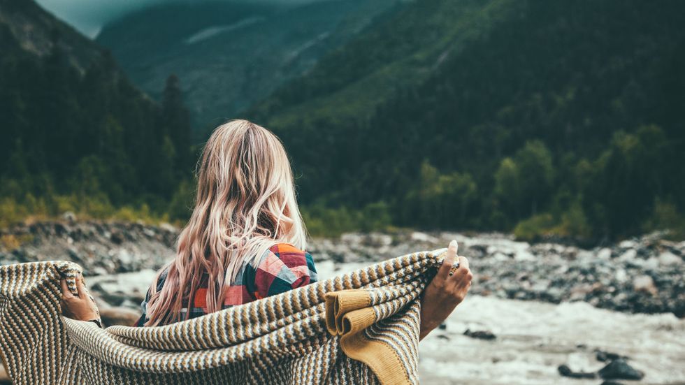 woman meditation in the mountains