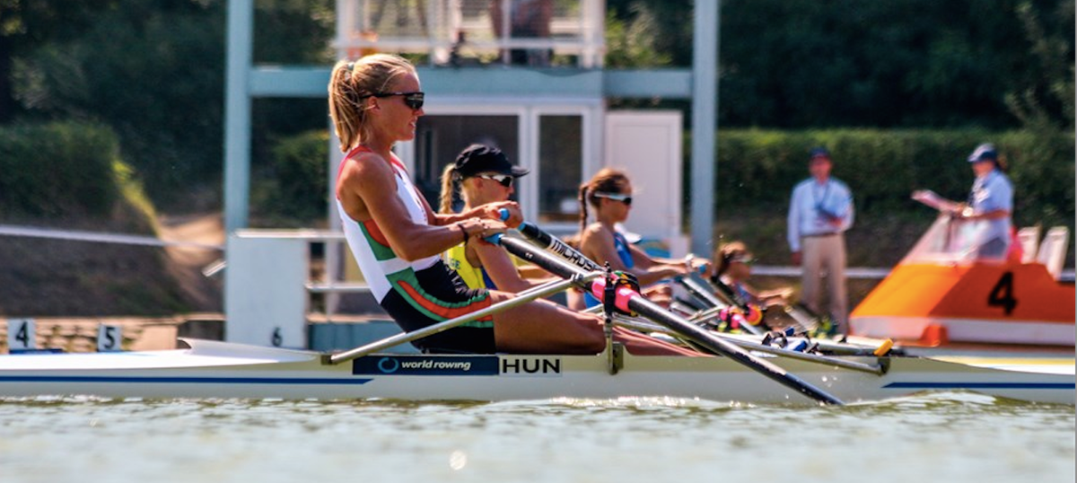 woman rows in competition