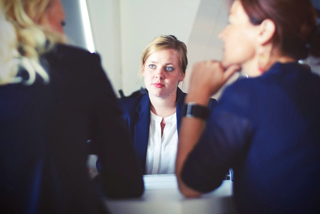 Woman sitting down at a job interview