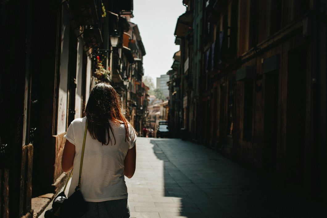 Woman walking through streets