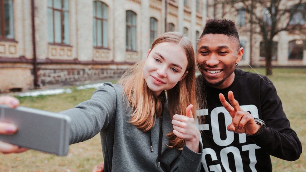 young couple on a date on college campus