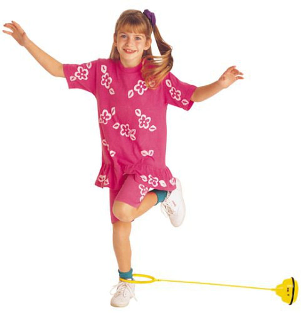 Young girl playing Skip Its
